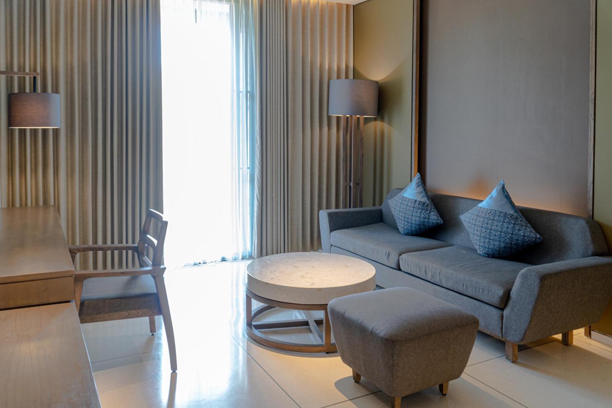 Wyndham Tamansari Jivva Resort Bali Siyut Zewnętrze zdjęcie A living room at the hotel